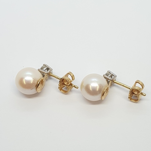 161 - A pair of Cultured Pearl and Diamond Ear Pendants, claw-set brilliant-cut diamond above cultured pea... 