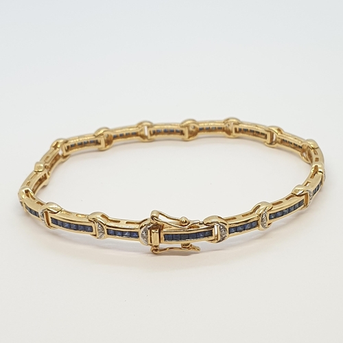 173 - A Sapphire and Diamond Line Bracelet, channel-set calibré-cut sapphires in articulated links set wit... 