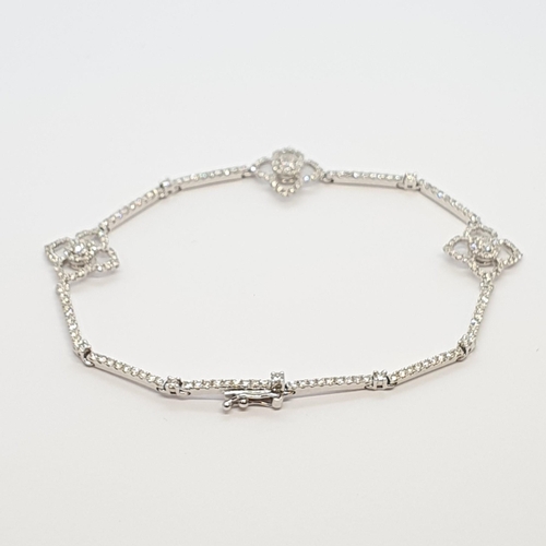 186 - A Diamond Bracelet by Kiki McDonough, pavé-set brilliant-cut diamonds in articulated links set betwe... 