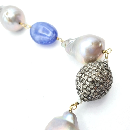 200 - An opera length Baroque Pearl, Tanzanite and Diamond Necklace, baroque pearls strung on yellow metal... 