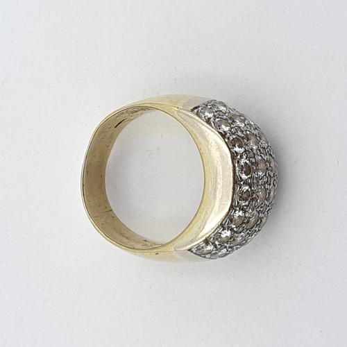 203 - A 1960s Diamond Bombé Ring pavé-set brilliant-cut diamonds in white metal setting on a heavy yellow ... 