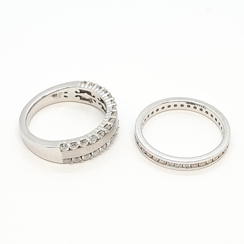 225 - A Diamond Eternity Ring (ring size N 1/2) and a half-hoop Diamond Ring (ring size N) in 18ct white g... 