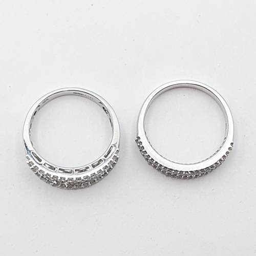 226 - Two Half-hoop Diamond Rings, set baguette and brilliant-cut diamonds, in 18ct white gold, both ring ... 