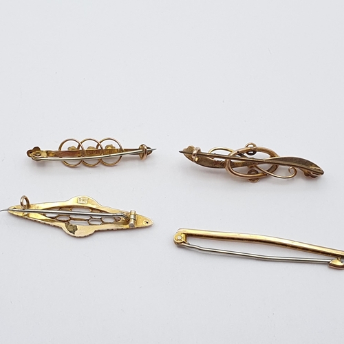 238 - A collection of four Brooches marked 9ct, total weight approx 5.2gms