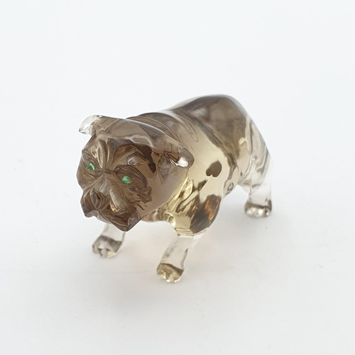 253 - A small carved smokey quartz Figure in the form of a Bulldog, with pair of inset green glass eyes, 1... 