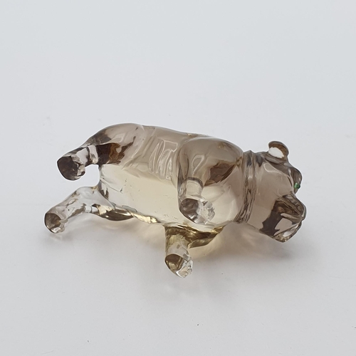 253 - A small carved smokey quartz Figure in the form of a Bulldog, with pair of inset green glass eyes, 1... 