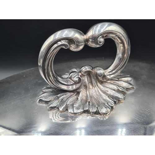 16 - An EP oval Meat Cover engraved coat of arms, 14in