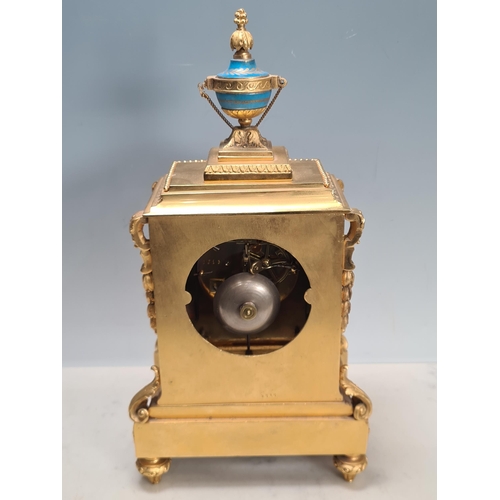 281 - A 19th century gilt metal and champlevé Mantel Clock with urn finial above the rectangular enamelled... 