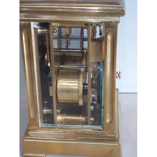 282 - A 19th century brass carriage Clock with gilt dial, silvered chapter ring, gilt filigree centre,  le... 