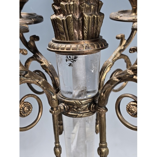 306 - A pair of Ormolu and rock crystal four branch Candelabra with central 