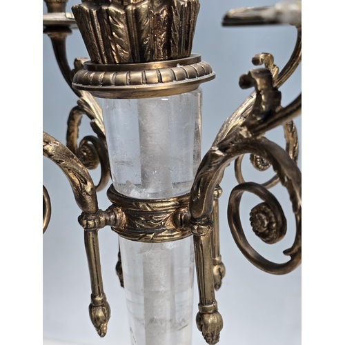 306 - A pair of Ormolu and rock crystal four branch Candelabra with central 