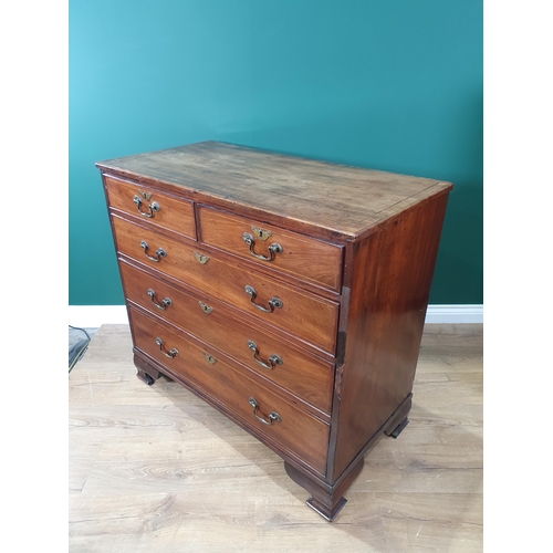 318 - A George III mahogany and chequer strung Chest of two short above three long graduated drawers raise... 