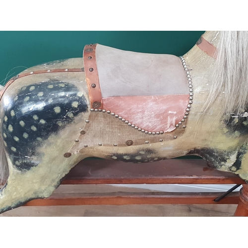 320 - A Victorian carved and painted dapple gray Rocking Horse in the manner of F.H. Ayres, with leather b... 