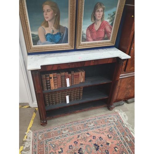 323 - A 19th Century rosewood open Bookcase, the marble top above a pair of turned columns on a plinth bas... 