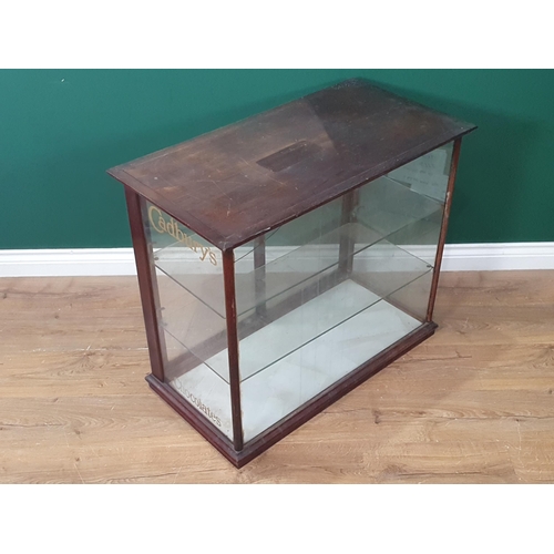 329 - A mahogany framed glazed Shop Display Cabinet with moulded cornice and plinth, a pair of glazed slid... 