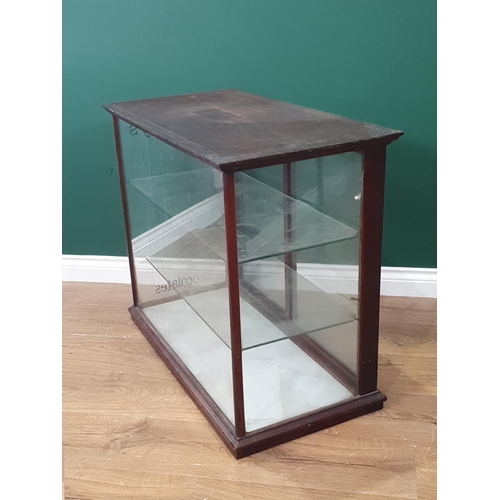 329 - A mahogany framed glazed Shop Display Cabinet with moulded cornice and plinth, a pair of glazed slid... 