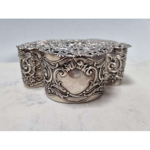 33 - An Edward VII silver Trinket Box, the pierced hinged lid with vase of flowers and floral scrolls, th... 