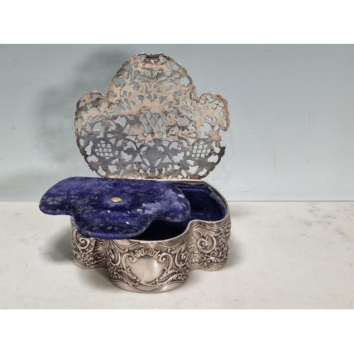 33 - An Edward VII silver Trinket Box, the pierced hinged lid with vase of flowers and floral scrolls, th... 