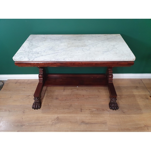 330 - A 19th Century mahogany Console Table with rectangular marble top, raised on carved and scrolled sup... 