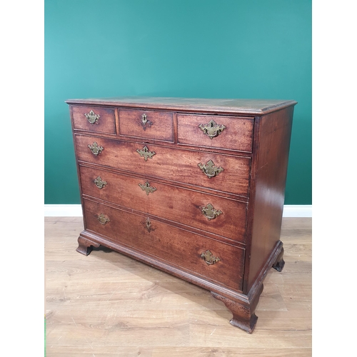 337 - A George III mahogany Chest of three short above three long graduated drawers raised on ogee bracket... 