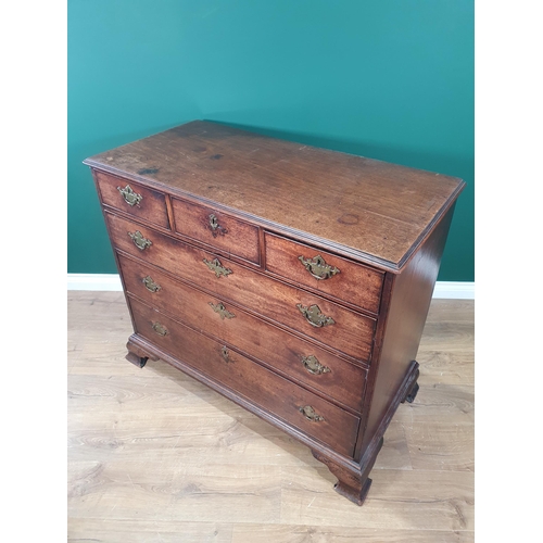 337 - A George III mahogany Chest of three short above three long graduated drawers raised on ogee bracket... 