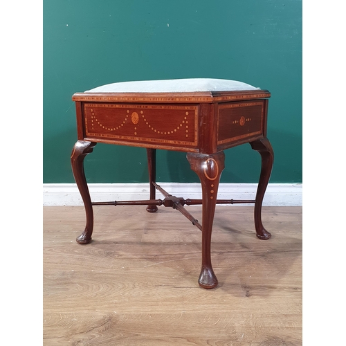 340 - An Edwardian inlaid Music Stool with upholstered hinged top, raised on cabriole supports and with cr... 