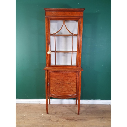 342 - An Edwardian satinwood and inlaid Display Cabinet with single astragal glazed door above a bowfronte... 