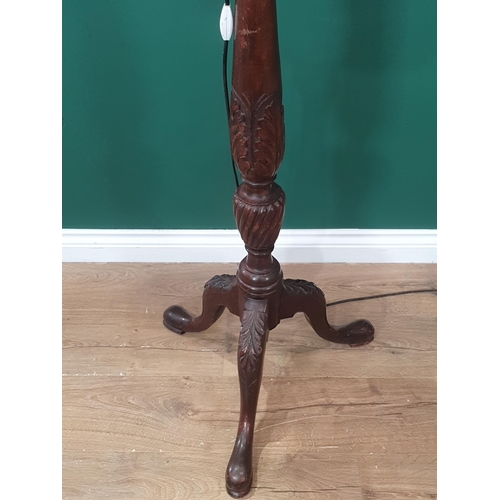 345 - A Georgian style mahogany Standard Lamp on carved tripod base, fitted shade and electricity