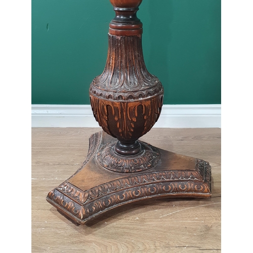 352 - A Victorian mahogany Hat Stand with turned column and carved triangular base