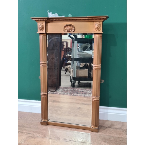 357 - A gilt framed Wall Mirror with scallop surmount and cluster columns, 2ft 4in x 1ft 6in