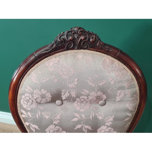 372 - A Victorian Nursing Chair with pink and grey floral button upholstered back on cabriole front legs a... 