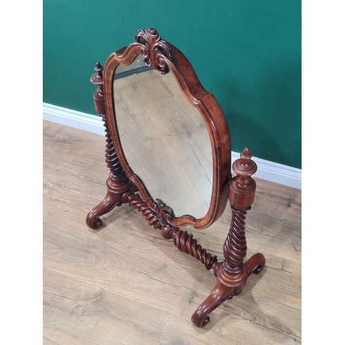 373 - A Victorian walnut framed Dressing Mirror with shaped oval plate on spiral turned cheval frame, 3ft ... 