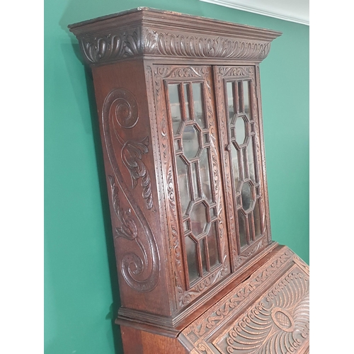 381 - A Victorian carved oak Bureau Bookcase with pair of astragal glazed doors, 3ft