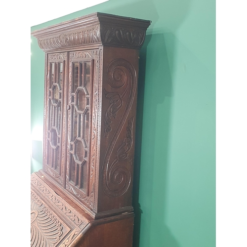 381 - A Victorian carved oak Bureau Bookcase with pair of astragal glazed doors, 3ft