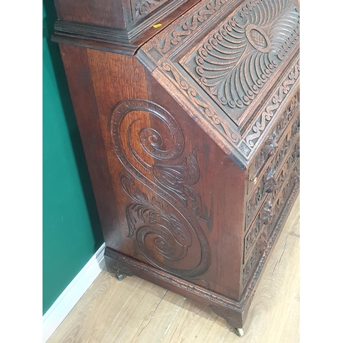 381 - A Victorian carved oak Bureau Bookcase with pair of astragal glazed doors, 3ft