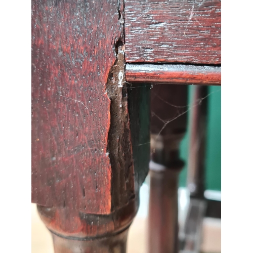 383 - An early 18th Century oak Gate-leg Table with rectangular drop leaves on turned and square legs unit... 