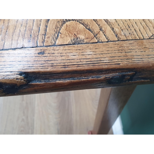 388 - An 18th century French Farmhouse Table with cleated oak three plank top on square tapering legs, 7ft... 