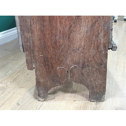 390 - A 17th century oak Plank Chest with rosette and leafage star carved front beneath iron lock plate, 4... 