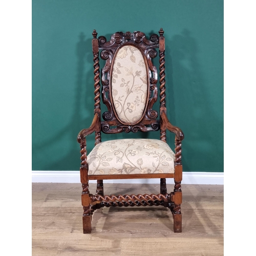 393 - An antique Queen Anne style walnut open Armchair with peach floral upholstered oval back panel and s... 