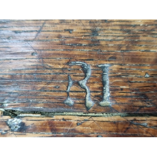 394 - A 17th Century oak Coffer, with sunken panel lid above carved scrolled frieze and carved floral deco... 