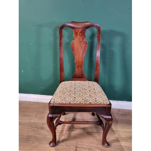 406 - An early 18th Century walnut single Chair with shaped vase splat back, drop-in seat and raised on ca... 