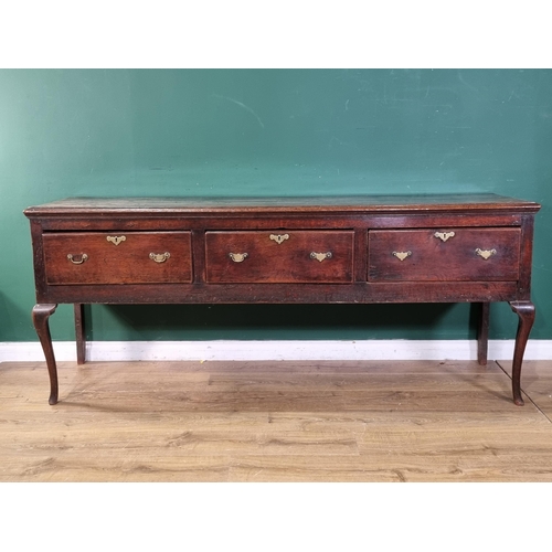 415 - An early 18th Century oak Dresser Base with moulded top above three drawers on cabriole front suppor... 