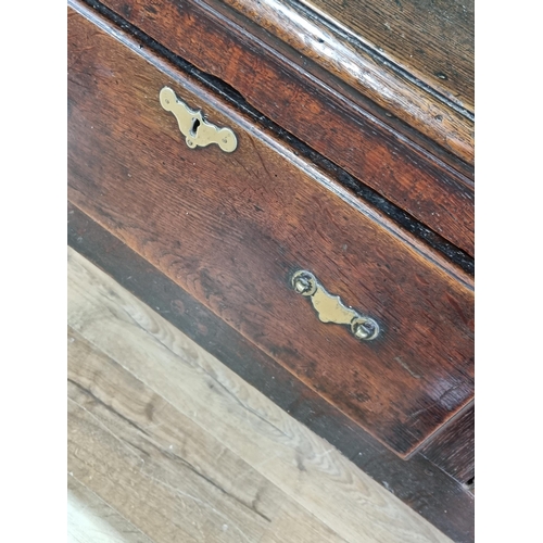 415 - An early 18th Century oak Dresser Base with moulded top above three drawers on cabriole front suppor... 