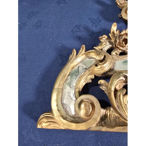 418 - An 18th Century gilt pediment Mirror/Door Pediment with bevelled mirror panels set amongst a design ... 