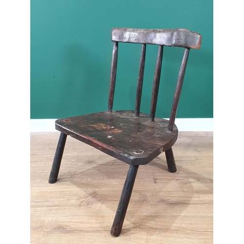 428 - A naive and primitive Stickback Chair with shaped backrest, wide elm seat and raised on splayed supp... 