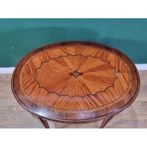 434 - An Edwardian rosewood and crossbanded oval Side Table with segmented centre and raised on squared ta... 