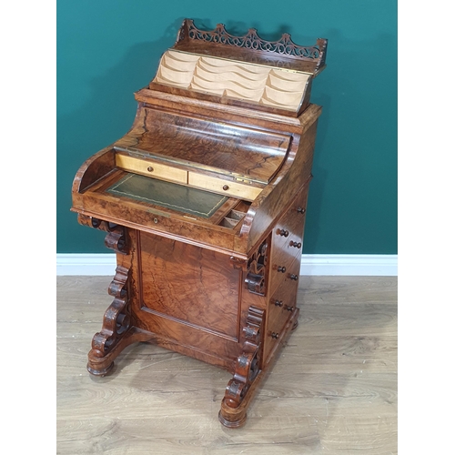 436 - A Victorian burr walnut veneered Davenport with rise and fall stationery compartment above lift-up l... 