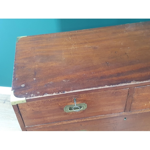 437 - A mahogany two-section Campaign Chest by 'S.W. Silver and Co London and Liverpool', the top section ... 