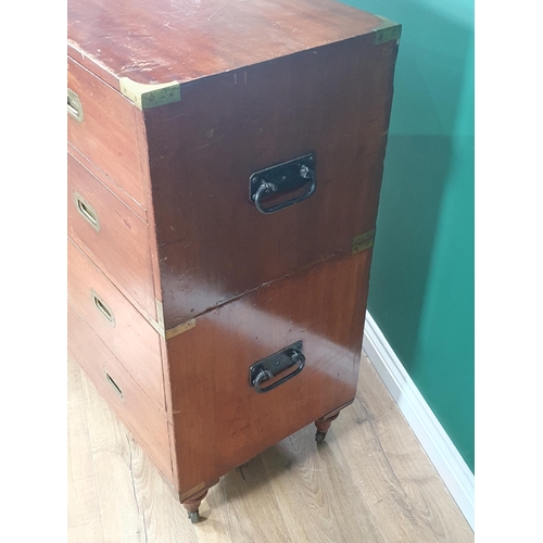 437 - A mahogany two-section Campaign Chest by 'S.W. Silver and Co London and Liverpool', the top section ... 