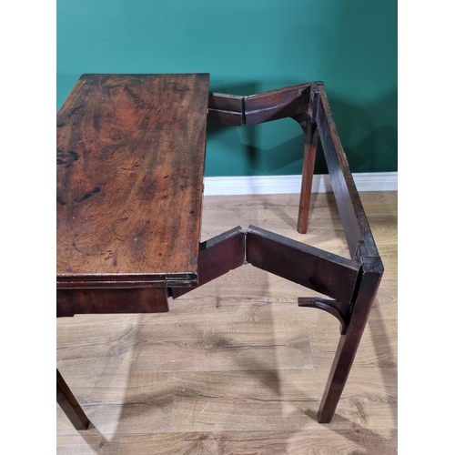 448 - A Georgian mahogany Card Table with foldover rectangular top, supported on a concertina action and r... 